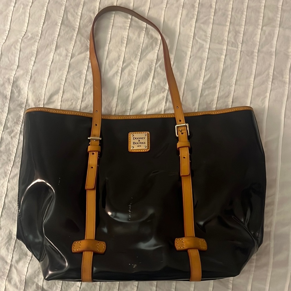 Used Dooney and Burke patent leather black , red interior